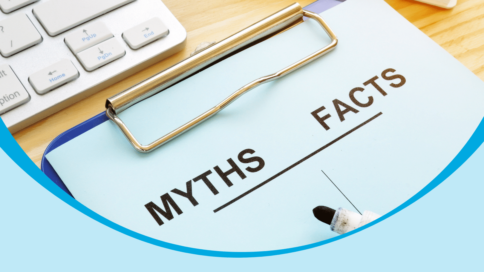AAC Myth-busting Series: Part 1 - Early Communication & Timing 1 a blue clipboard with a pen and a white keyboard, with the words AAC myth-busting